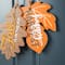 Glitzhome® 24.5" Fall Wood Maple Leaves with Bowknot Door Hanger
